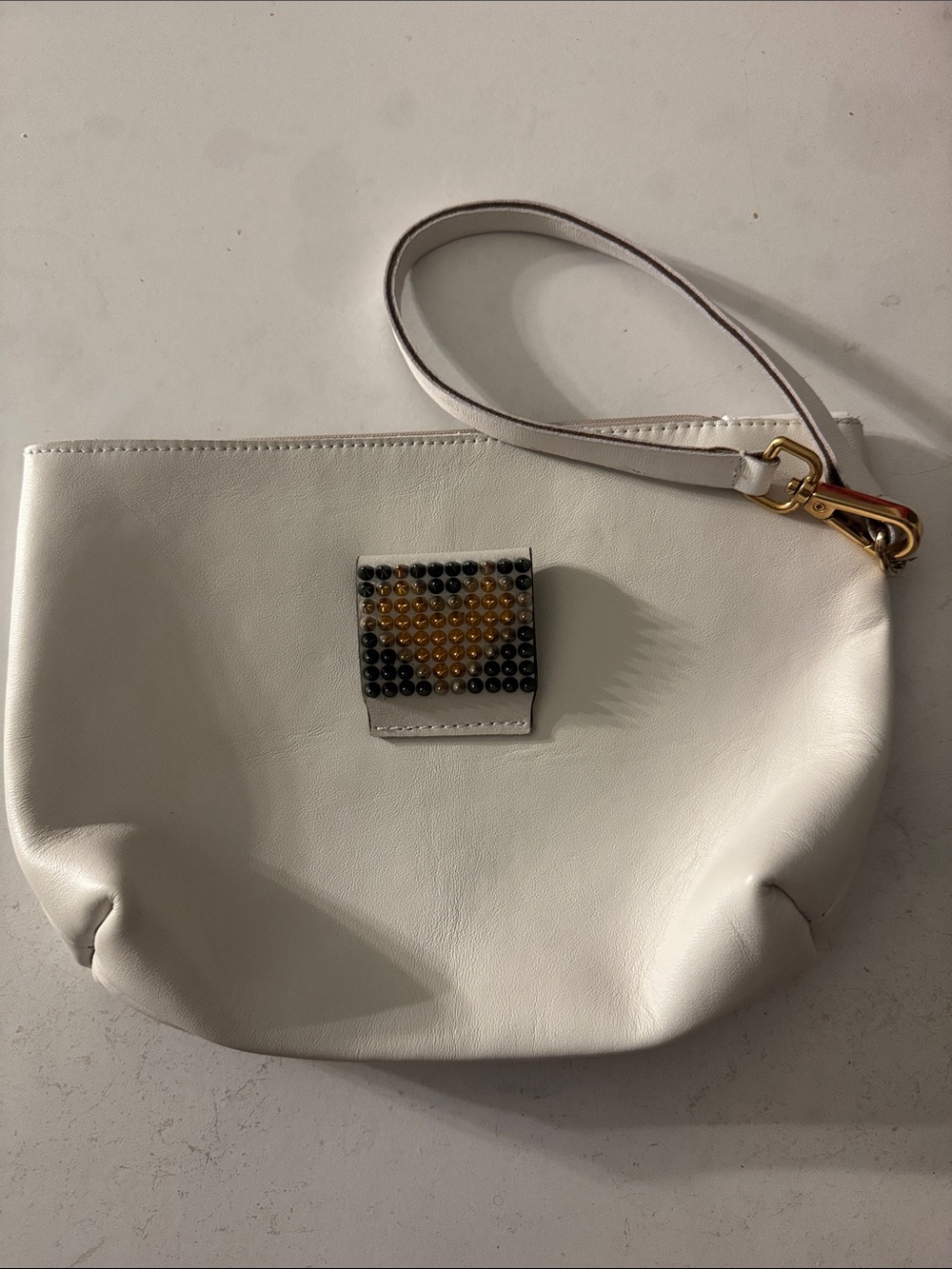Italian Shoemakers White Wristlet Clutch with Beaded Accent